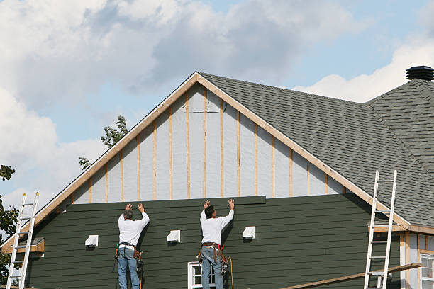 Professional Siding Contractor technician working in Addison, TX